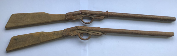 antique pair potato or cork firing gun toys